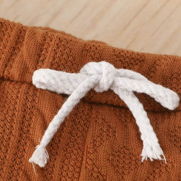 AI-generates product visualization - Cable Knit Romper Set — Warm Rust