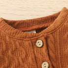AI-generates product visualization - Cable Knit Romper Set — Warm Rust